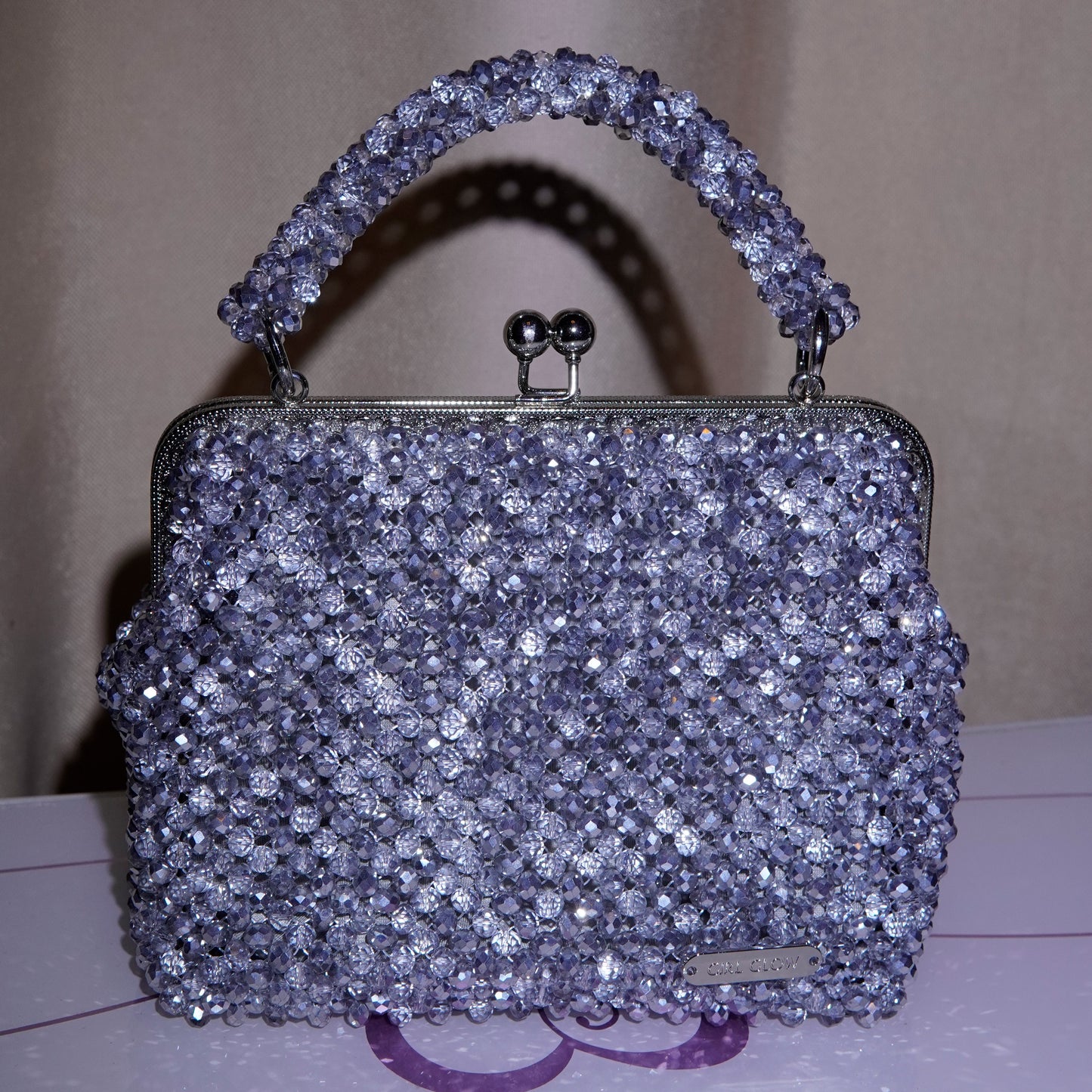 Bolso de mano, medio cristal y plata 