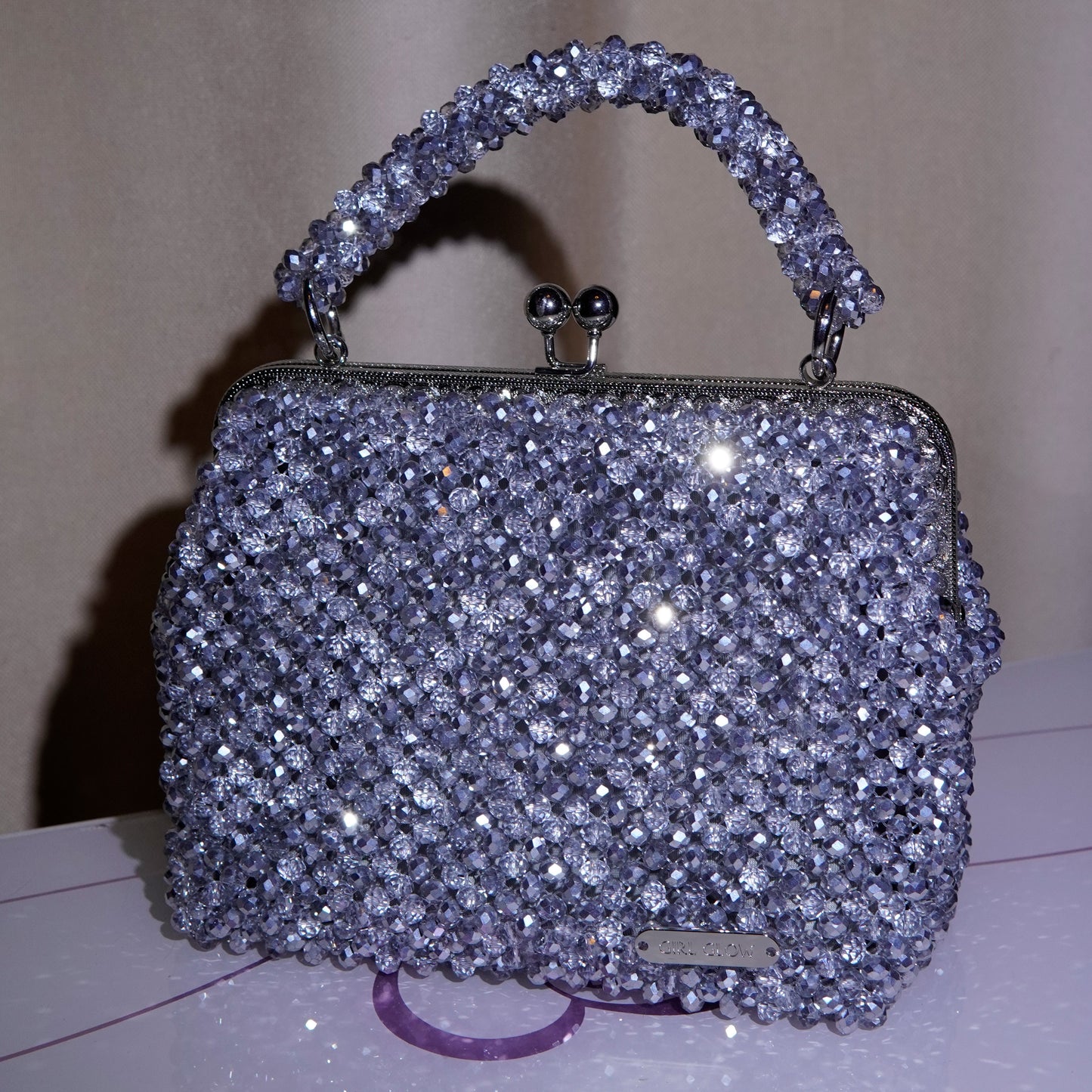 Bolso de mano, medio cristal y plata 